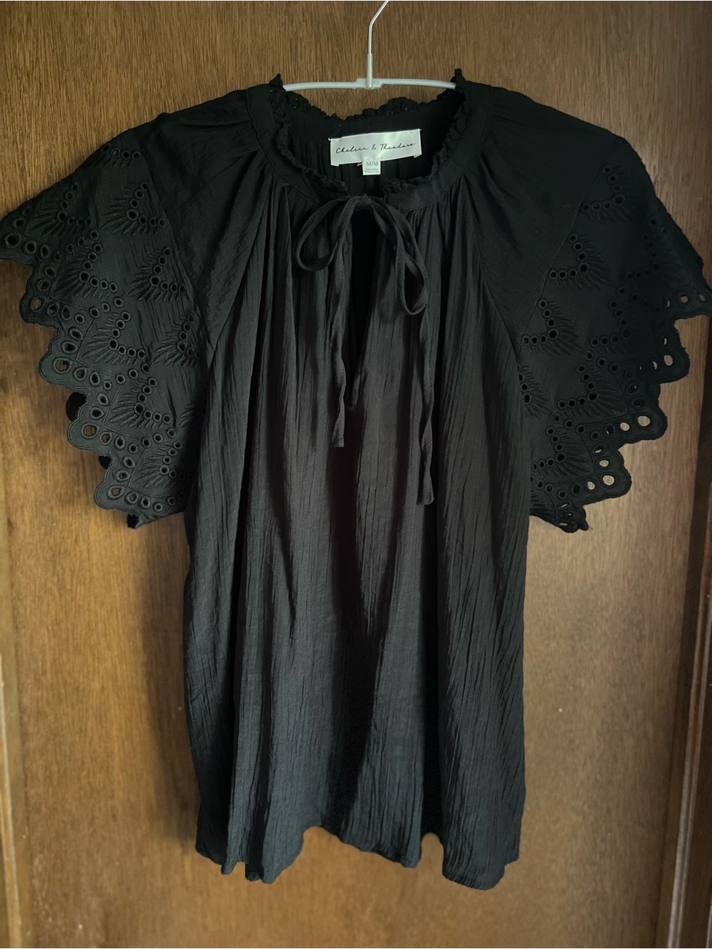 Chelsea & Theodore Black Eyelet Flutter Sleeve Top